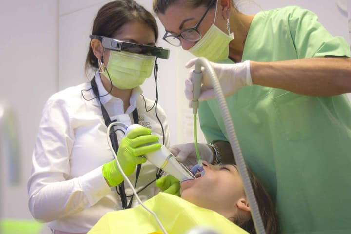 Intraoral scan being taken for custom dental bridge fabrication